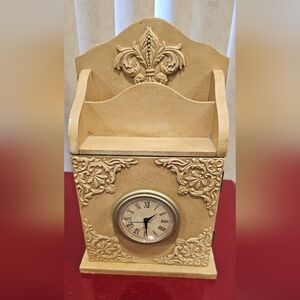 Elegant Cream Mantel Clock with Intricate Design